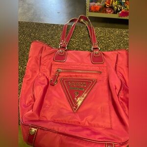 Guess, pink purse, has a few stains, and used